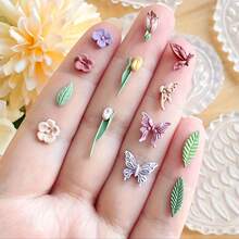 1 PIEZA Molde de silicona en forma de corazón mini para plantas - Usado para manualidades de arcilla polimérica, pendientes hechos a mano, decoración de uñas DIY, diseño de flor detallado con colores suaves, perfecto para artesanías y proyectos DIY. Molde con forma de flor / Molde de hoja / Molde de mariposa / Herramienta de fabricación duradera - transparente - Ver 2