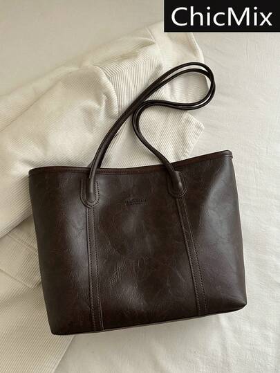 时尚新款纯色大容量字母Logo简约手提包，柔软百搭，实用优雅，女士单肩包，适合购物、携带钱包、休闲外出，适合年轻女性、大学生、职场新人及白领人士。也非常适合办公室、大学、工作、商务、通勤、户外活动、旅行和郊游等场合。