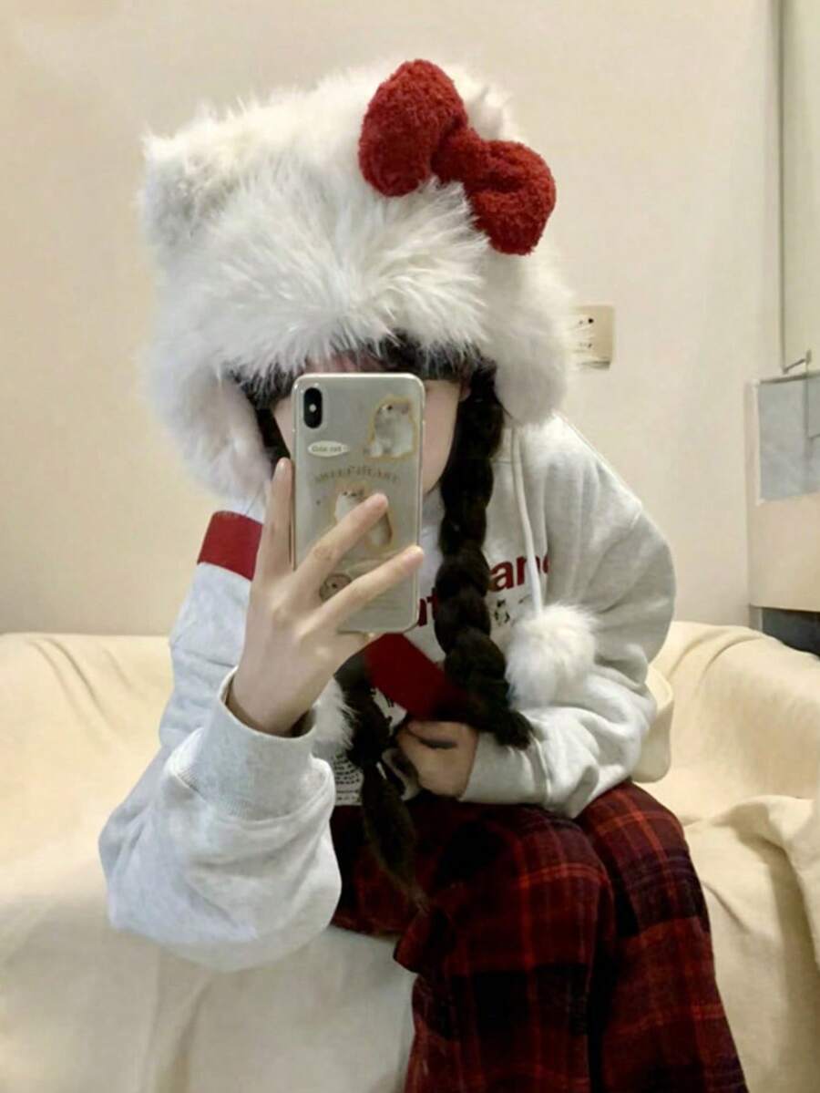 蝴蝶结设计毛绒猫耳帽，秋冬时尚单品