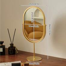 Espejo ovalado dorado elegante, con marco de metal estilizado, superficie de vidrio pulido, espejo de maquillaje portátil para decoración de dormitorio y puerta, sin necesidad de energía, decoración de dormitorio, diseño de espejo estilizado, espejo portátil, espejo decorativo de pared