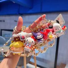 三丽鸥天使吊饰 - 官方授权配饰，饰有梦幻天使图案。可调节链条，细节精致，完美搭配包袋或钥匙，提升您的日常造型。 - 紫色 - 查看 7