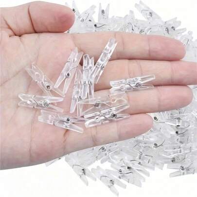 About 50pcs Mini Clear Plastic Photo Clips – Versatile Clothespins For Photos, Cards, Towels & Socks, Perfect For Clothesline Displays, Home Decor, DIY Craft Projects, Bulletin Boards, Wedding Or Party Favors, Nursery Organization, Gift Tags, And Creative Styling On Shelves, Racks, And Drape Arrangements; Small Transparent Clips That Hold Memories Securely Without Damage, Easy To Use, Lightweight, Durable, Suitable For Photo Albums And Scrapbooks