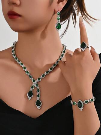 全新奢华铜镶嵌粉红锆石4件套首饰套装。包含项链、耳环、戒指和手链。适合日常佩戴、正式场合、派对、婚礼。礼品套装