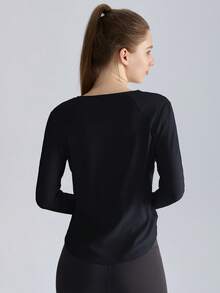 1pc Women's Solid Color Loose Fit Long Sleeve Fitness T-Shirt