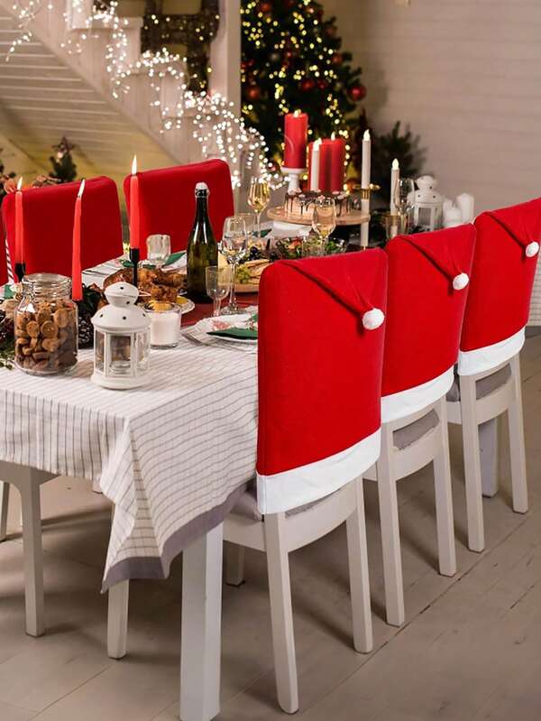 1/4/6 pièces Ensemble de housses de chaise Chapeau de Père Noël rouge festif - Chapeau de Noël en tissu non tissé avec pompon, parfait pour le dîner de Noël et les fêtes, ajoute une touche chaleureuse et festive à votre décoration de table, idéal pour les réunions de famille, décorations de table de Noël
