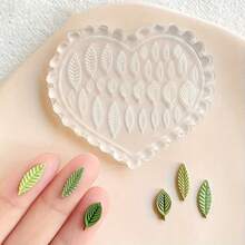 1 PIEZA Molde de silicona en forma de corazón mini para plantas - Usado para manualidades de arcilla polimérica, pendientes hechos a mano, decoración de uñas DIY, diseño de flor detallado con colores suaves, perfecto para artesanías y proyectos DIY. Molde con forma de flor / Molde de hoja / Molde de mariposa / Herramienta de fabricación duradera - transparente - Ver 8