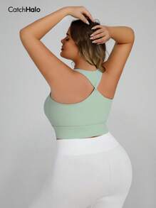 Catch Halo High Impact 4-Way Stretch Plus Size Sport Bra For Women - Scoop Neck & Built In Bra & Twist Back & Wide Shoulder Straps Workout Bra Curve | Slimming Figure Contour High Support Cropped Cami Top | Quick Dry Zero Bounce Workout Bra For Yoga, Pilate, Running, Gym, Cycling (Mint Green, 0XL~3XL)