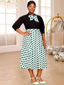 Conjunto retro de dos piezas con blusa negra, falda verde con puntos A-line y mangas de farol con lazo - Verde - Ver 3