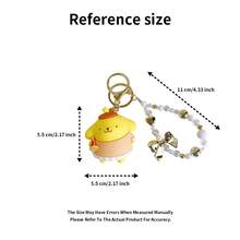 三丽鸥天使吊饰 - 官方授权配饰，饰有梦幻天使图案。可调节链条，细节精致，完美搭配包袋或钥匙，提升您的日常造型。 - 黃色 - 查看 8