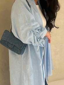 这款优雅经典的极简主义抽绳袖口女式睡袍散发着高贵典雅的气息，适合所有季节和各种文化活动。 - 淺藍色 - 查看 6