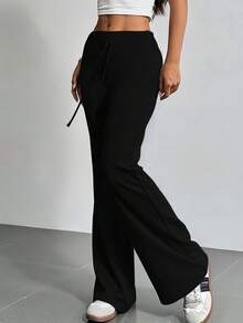 Pantalones deportivos con cintura de cordón y pierna acampanada