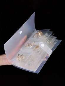 [كتاب مجوهرات محمول] كتاب تخزين مجوهرات محمول بشبكة 160 خلية شفافة | ألبوم بأقسام متعددة من البلاستيك للأقراط والخواتم والقلائد - تخزين مضغوط للسفر والمنزل، تخزين المجوهرات، لف المجوهرات مع إغلاق آمن بأزرار، ضروريات السفر، اكسسوارات السفر، حقائب السفر، عودة إلى المدرسة، لوازم المدرسة، صندوق مجوهرات (بدون كيس سحاب)