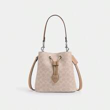 Coach Túi xách nữ Rowan 22 bằng da mềm, kiểu dáng xô, túi đeo chéo, túi đeo vai, ví cầm tay thanh lịch, túi xách có ngăn đựng tiền lẻ. - Vàng cát với màu nâu nhạt - Xem 6