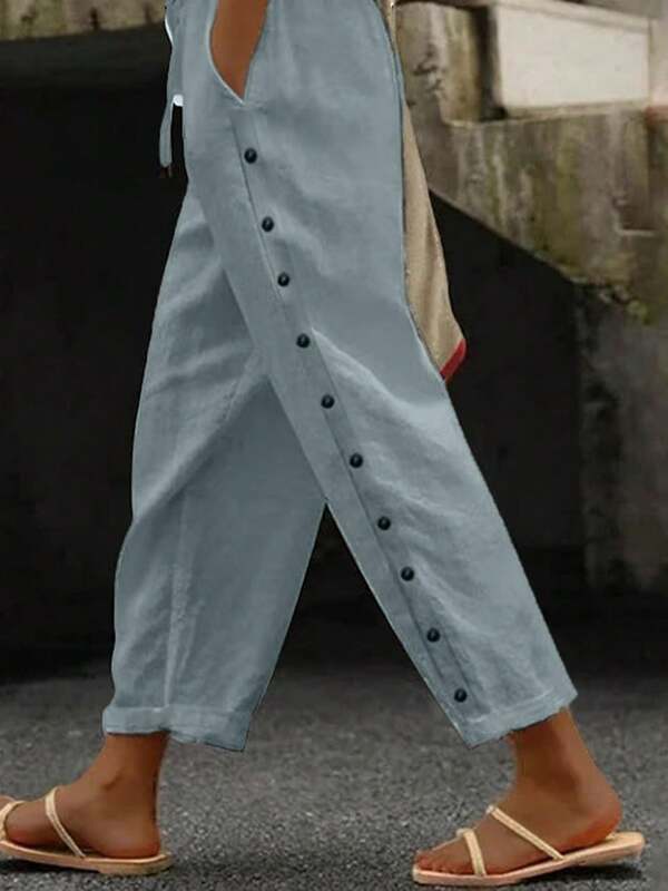 Pantalones de cintura elástica de unicolor con cordón ajustable, parche con botones laterales y bolsillos para mujeres occidentales - Adecuados para uso casual, ropa de estar en casa y ocasiones al aire libre