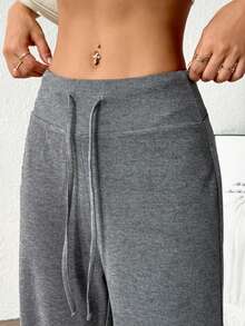 Pantalones deportivos sueltos de color sólido de cuatro estaciones para mujer, pantalones deportivos con cintura ajustable con cordón, pantalones sueltos casuales simples y cómodos, adecuados para el uso diario, modernos y modernos. - Gris - Ver 6