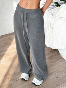 Pantalones deportivos sueltos de color sólido de cuatro estaciones para mujer, pantalones deportivos con cintura ajustable con cordón, pantalones sueltos casuales simples y cómodos, adecuados para el uso diario, modernos y modernos. - Gris - Ver 1