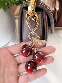 1pc Cherry Fruit Bow Heart Shaped Golden Keychain, Suitable For Car Keys And Bag Decoration