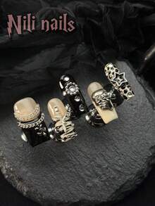 可爱的万圣节美甲套装，包含 10 片手工制作的亚克力按压式美甲片，中号方形美甲，米色和黑色法式美甲，手绘豹纹和不对称条纹，3D 鬼脸，玫瑰和星星美甲装饰，附赠凝胶贴纸和指甲锉。 - 米色 - 查看 4