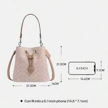 Coach Túi xách nữ Rowan 22 bằng da mềm, kiểu dáng xô, túi đeo chéo, túi đeo vai, ví cầm tay thanh lịch, túi xách có ngăn đựng tiền lẻ. - Vàng cát với màu nâu nhạt - Xem 8