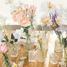 24个复古迷你花瓶，款式多样，精致小巧，适合桌面装饰，透明花盆，雕工精美，是乡村婚礼、派对、餐桌装饰、家居装饰、花瓶、桌面摆件、生日毕业礼物、房间装饰玻璃花瓶的理想之选。 - 彩色 - 查看 9
