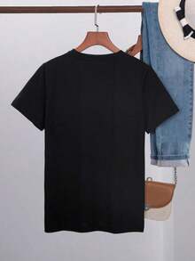 Camiseta de manga corta blanca de verano para mujeres con elemento floral estilo resort de playa casual y enérgico, camiseta suelta, casual y versátil - Negro - Ver 2