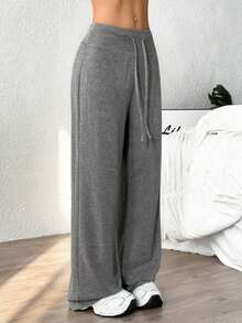 Pantalones deportivos sueltos de color sólido de cuatro estaciones para mujer, pantalones deportivos con cintura ajustable con cordón, pantalones sueltos casuales simples y cómodos, adecuados para el uso diario, modernos y modernos. - Gris - Ver 5