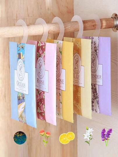 1/5/10 peças de sachês perfumados para guarda-roupas suspensos, rosas, oceano, lavanda, lírio e outros aromas, sachês desodorizantes para guarda-roupas, bolsas de fragrâncias portáteis, purificadores de ar para guarda-roupas, artigos para casa, materiais de volta às aulas, adequados para gavetas, armários, guarda-roupas, banheiros, carros, Dia dos Namorados, Ramadã, Halloween, Natal e outros festivais, acessórios para banheiro