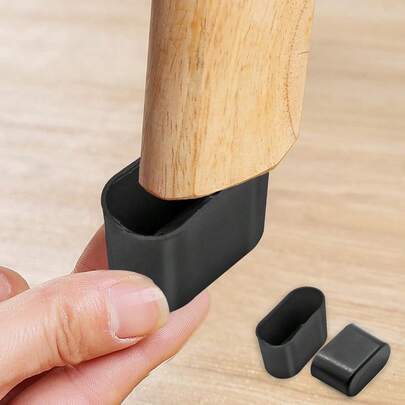 Miếng bọc chân ghế bằng nhựa hình bầu dục, kích thước nhỏ, 20mm x 40mm, màu đen, dùng trong nhà và ngoài trời.