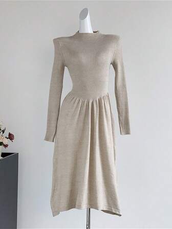 Knitted Fall/Winter Dress For Ladies, Sweater Dress With Semi-High Collar, Fitted With Pleats At The Waist And Wide Hem.