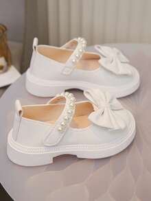 Zapatos de cuero lindos y de moda para niñas, zapatos planos cómodos para la escuela y uso al aire libre con decoración de moño en color blanco puro, zapatos casuales para bebés, zapatos para todas las estaciones, recomendados para volver a la escuela