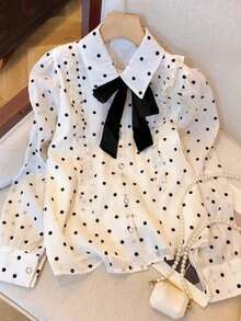 Blusa elegante francesa con lunares y lazo, camisa de gasa con cuello polo, botones de strass y estampado de lunares en todo el diseño, efecto estilizante