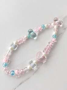 1条亚克力心形串珠手机挂绳，适合作为礼物送给母亲、家人、朋友，也可用于生日、节日等场合，是手机的精美挂饰。 - 彩色 - 查看 6