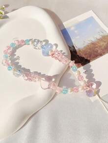 1条亚克力心形串珠手机挂绳，适合作为礼物送给母亲、家人、朋友，也可用于生日、节日等场合，是手机的精美挂饰。 - 彩色 - 查看 4