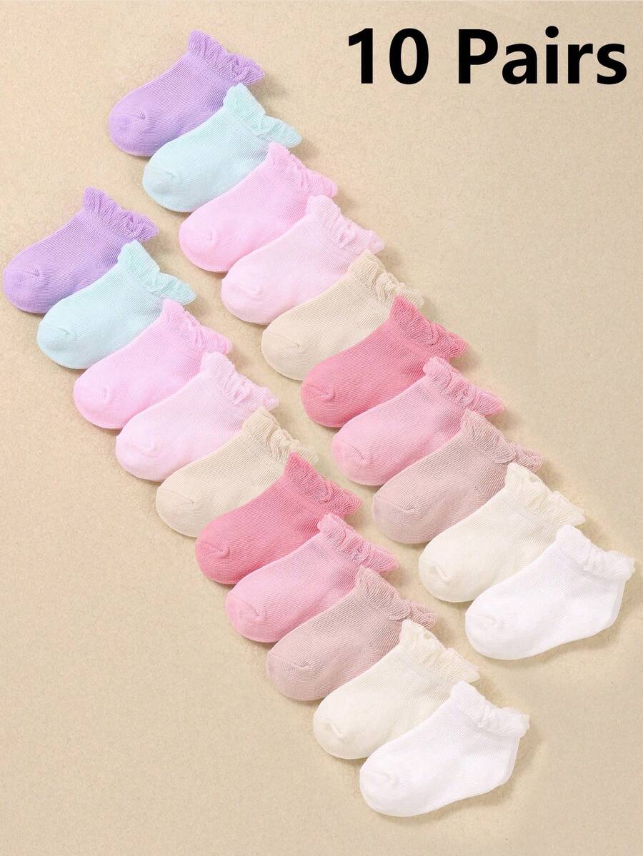 10 đôi tất ngắn màu Dopamine, thiết kế có viền bèo nhún cho bé gái. Được làm từ vải lưới ren mềm mại và thoải mái. Thích hợp cho trẻ sơ sinh từ 0-3 tuổi. - Nhiều màu - Xem 1