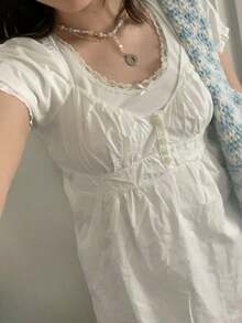 Women Y2k Fairycore Babydoll Shirt Top Plaid/Solid Color Lace Trim V-Neck Short Sleeve Button Front Ruffle Hem Gingham T Shirts Crop Tops Teen Girls Grunge Going Out Tunic Tops Cute Flowy Tee Vintage Aesthetic Clothes Casual Daily Streetwear - 白色 - 查看 6