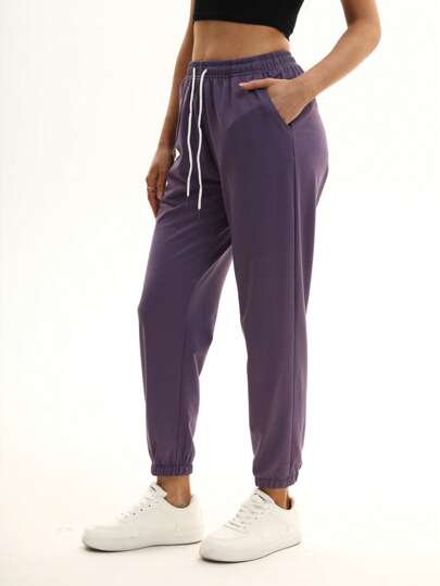 1 条女式纯色设计带口袋休闲宽松长裤，适合日常穿着、徒步旅行、旅游、登山、跑步、骑自行车