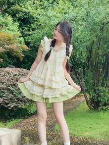 طقم فستان وتنورة بتصميم فراشة بقصة فضفاضة باللون الأخضر النعناعي، مناسب للارتداء اليومي العادي أو للسفر، وكذلك لارتداء في مناسبة هالوين