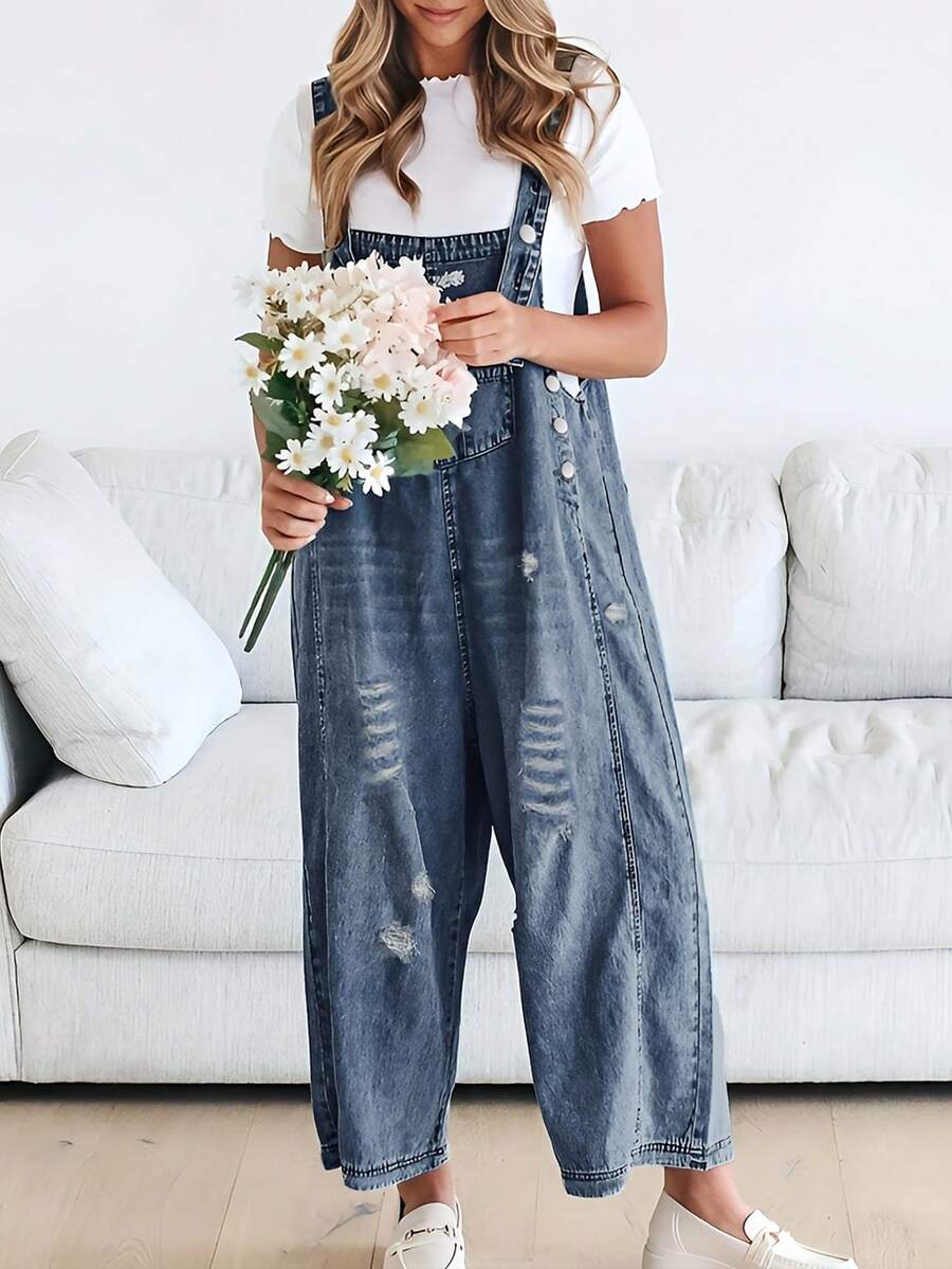 Pantalones de peto sueltos con lavado medio y desgastados de moda y versátiles