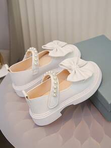 Zapatos de cuero lindos y de moda para niñas, zapatos planos cómodos para la escuela y uso al aire libre con decoración de moño en color blanco puro, zapatos casuales para bebés, zapatos para todas las estaciones, recomendados para volver a la escuela