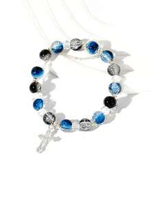 1pc Cool Blue Cross Bracelet. Transparent Blue Crystals Are Strung Together To Form The Chain, Adorned With A Silver Cross Pendant, Exuding A Cool And Crisp Vibe. The Blue Hue Resembles The Deep, Luminous Depths Of The Ocean, While The Cross Features Clean, Sharp Lines. The Silver Chain Is Delicate And Hugs The Wrist Comfortably. Under The Play Of Light And Shadow, The Crystals Refract Delicate Blue Hues, And The Silver Accents Shimmer With A Matte, Cool White Glow. Whether Worn Alone Or Layered With Other Pieces, It Evokes A Sense Of Detachment And Minimalist Elegance, Perfectly Complementing Minimalist Outfits And A , Tranquil Aesthetic.Perfect Gift For Birthdays, Holiday Gifts, And Parties. Suitable For Daily Wear And Holiday Celebrations, Suitable For All Seasons, And Is An Ideal Choice For Holiday Accessories. - Blue - 查看 5