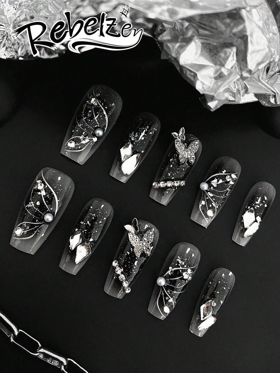 10片装手工按压式美甲贴片，长棺材形，手工3D立体浮雕及手绘工艺，饰有3D蝴蝶、水钻、珍珠、银箔装饰，黑色渐变及银色闪粉底色，四季皆宜，适合甜美酷女孩、哥特风爱好者、派对、约会及日常佩戴，是甜美酷女孩、蝴蝶爱好者、哥特风爱好者及优雅哥特风粉丝的理想之选。套装包含一瓶果冻胶和一把指甲锉。 - 彩色 - 查看 1