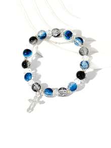 1pc Cool Blue Cross Bracelet. Transparent Blue Crystals Are Strung Together To Form The Chain, Adorned With A Silver Cross Pendant, Exuding A Cool And Crisp Vibe. The Blue Hue Resembles The Deep, Luminous Depths Of The Ocean, While The Cross Features Clean, Sharp Lines. The Silver Chain Is Delicate And Hugs The Wrist Comfortably. Under The Play Of Light And Shadow, The Crystals Refract Delicate Blue Hues, And The Silver Accents Shimmer With A Matte, Cool White Glow. Whether Worn Alone Or Layered With Other Pieces, It Evokes A Sense Of Detachment And Minimalist Elegance, Perfectly Complementing Minimalist Outfits And A , Tranquil Aesthetic.Perfect Gift For Birthdays, Holiday Gifts, And Parties. Suitable For Daily Wear And Holiday Celebrations, Suitable For All Seasons, And Is An Ideal Choice For Holiday Accessories. - Blue - 查看 5