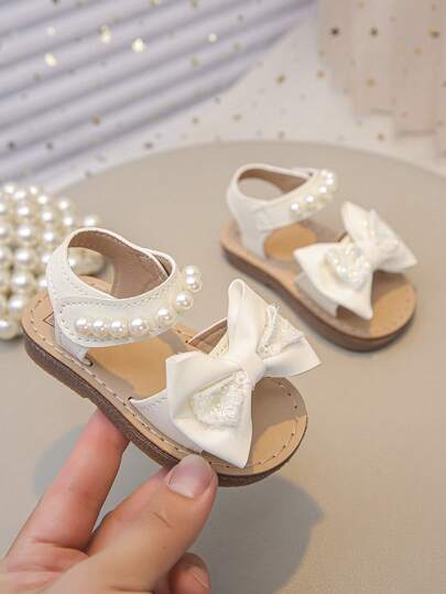 女童时尚可爱平底凉鞋，小学PU凉鞋，蝴蝶结珍珠装饰，休闲户外/校园凉鞋，推荐用于假期