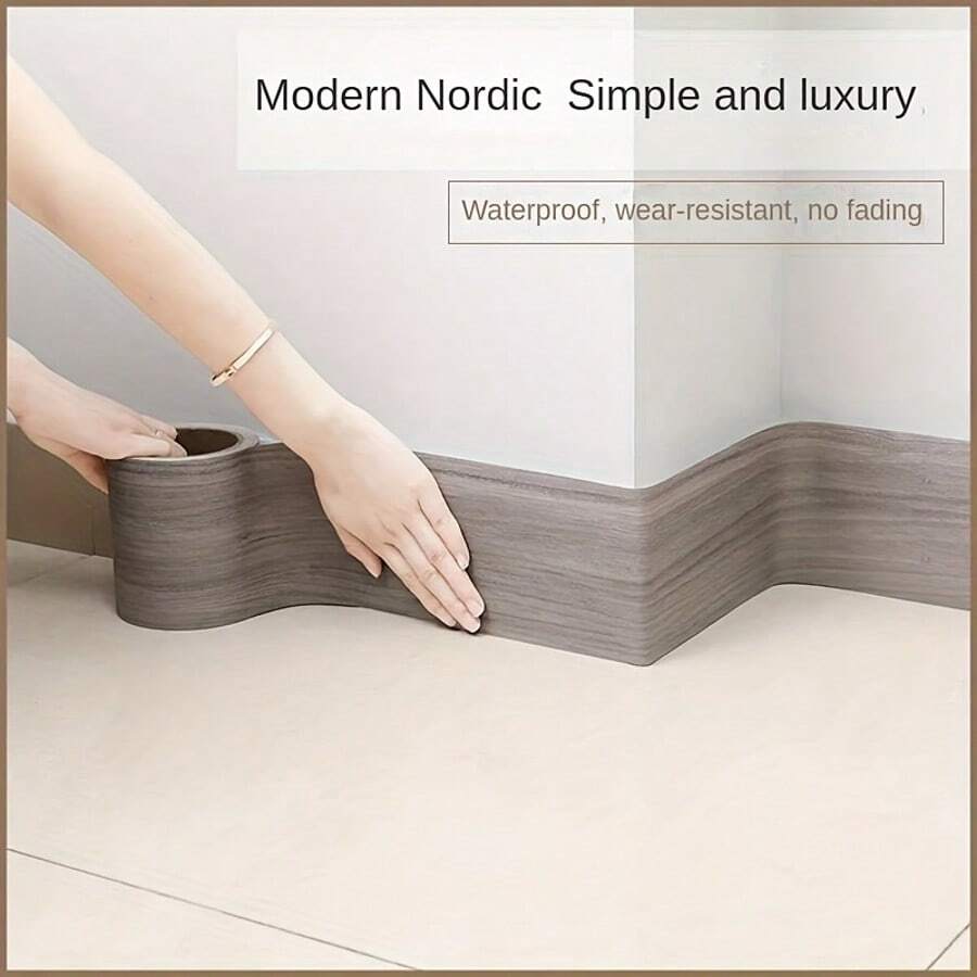 Miếng dán tường viền chân tường tự dính chống thấm nước 5cm*5m đơn giản là "vật trang trí vô hình" cho bức tường! Kết cấu vân gỗ giả với độ dày dặn tạo cảm giác như một đường viền eo mềm mại được khắc sâu vào tường. Nó được đặt trong một ngôi nhà theo phong cách Bắc Âu hiện đại.