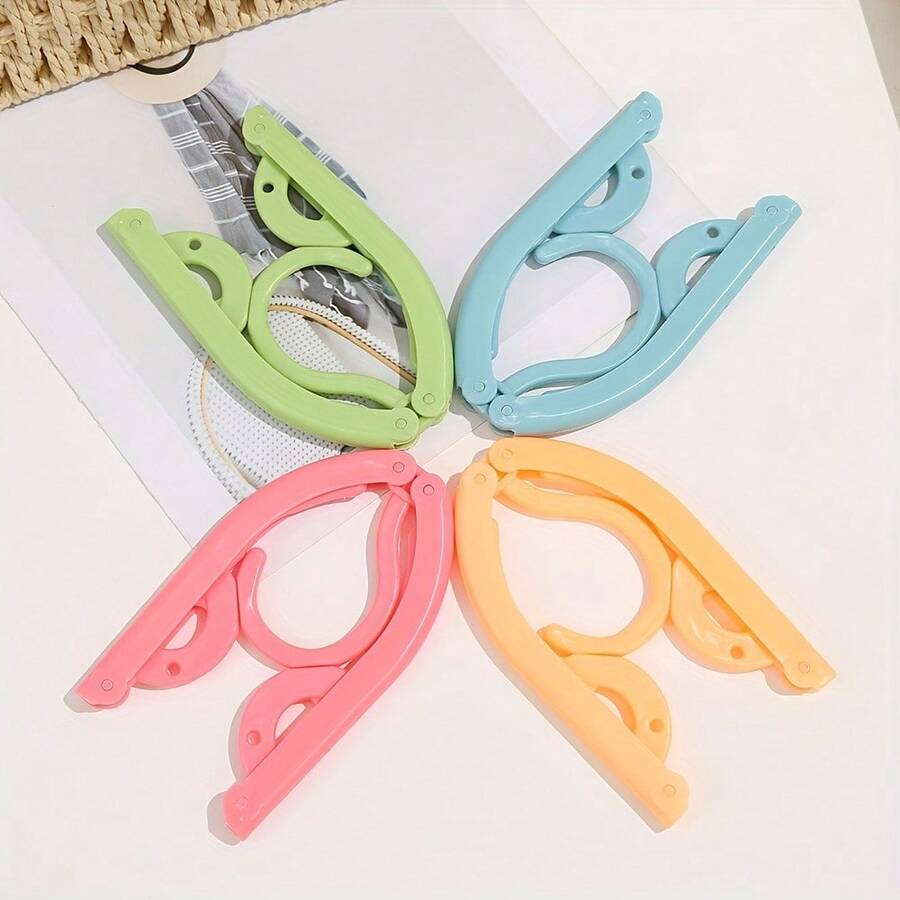 1pc Colorful Foldable Travel Clothes Hanger With Non-Slip Design, Durable Plastic Construction, Space-Saving And Portable For Home, Retail Stores And Clothing Racks; Lightweight, Versatile, Easy-Organize Wardrobe, Ideal For Travel, Compact Closet Organization, Durable Hangers For Shirts, Blouses, Jackets, And Garments On Racks And Dressers - Multicolor - View 1
