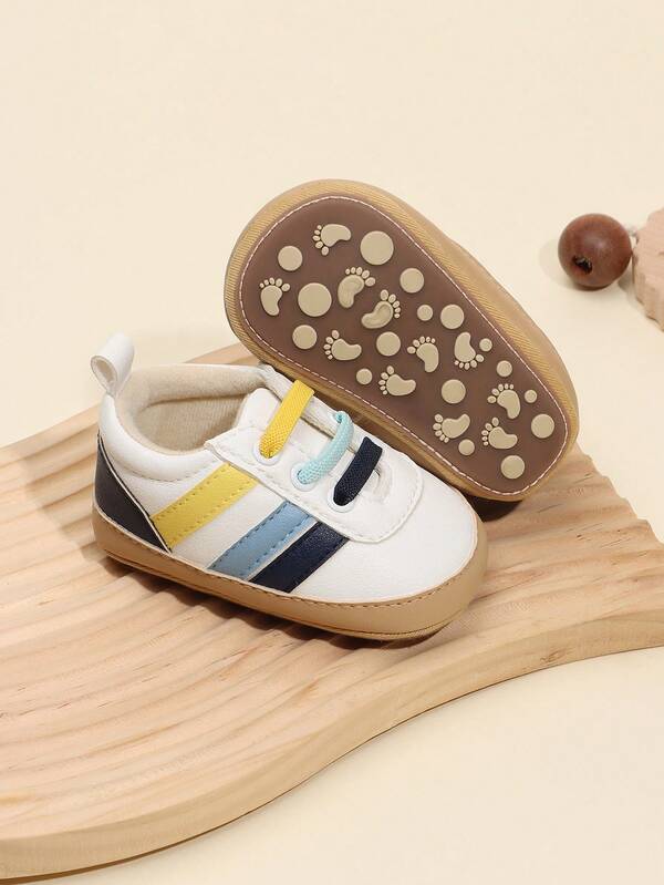 1 Paar Jungen Gestreifte Patchwork PU Slip-On Design Flache rutschfeste weiche Gummisohle Lässig Sportschuhe, geeignet für Frühling und Herbst