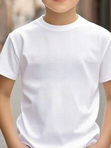 Set de 4 camisetas básicas y casuales de color blanco o negro para niños de 3 a 7 años, adecuadas para usar de forma casual, para hacer deporte, ideales para el uso diario. Cuatro Camisetas básicas con Diseño clásico de manga corta y cuello redondo para niños. - Blanco - Ver 2