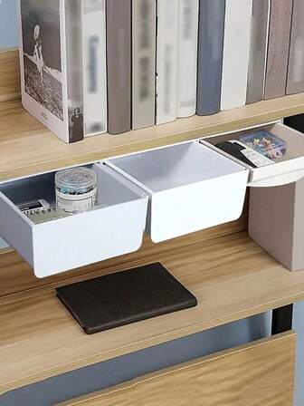 白色自粘式抽屉滑出式收纳盒，隐藏式收纳方案，塑料材质，适用于办公室、家庭、宿舍，保持桌面整洁，安装简便，节省空间，时尚办公配件，圣诞节、感恩节、开学季的理想礼物，高转化率关键词：实用、时尚、多功能、学生和职场人士必备、现代设计、便携、多用途收纳、秋冬季必备、精美礼品