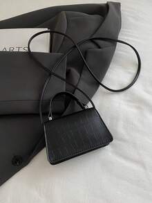 Túi xách mini nữ thời trang thu đông 2025, chất liệu PU dập vân cá sấu, kiểu dáng tối giản, thích hợp cho mua sắm và sử dụng hàng ngày, lý tưởng cho phụ nữ trẻ, sinh viên đại học, người mới đi làm và nhân viên văn phòng. Chiếc túi này hoàn hảo cho văn phòng, trường học, công việc, kinh doanh, đi lại, hoạt động ngoài trời, du lịch và những chuyến đi ngắn ngày. - màu đen - Xem 5