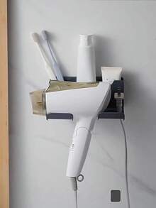1pc Blow Dryer Holder, No Drill Self-Adhesive Installation, Wall Mounted Storage Rack, Plastic Material, Holds Combs & Toiletries, Suitable For Bathroom, White/Black/Gray